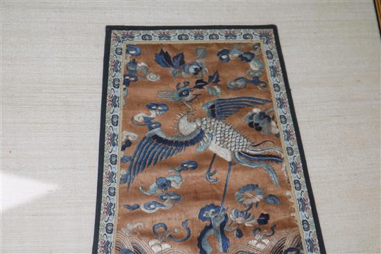 A Chinese embroidered silk phoenix panel, Qing